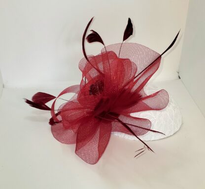 Burgundy clip on hat, leftside view.