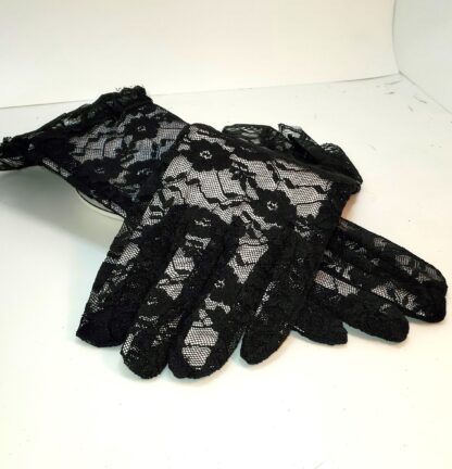 Fascinator's black lace gloves.