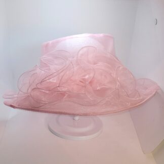 Pink wide brim hat with bow, front view.