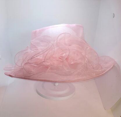 Pink wide brim hat with bow, front view.