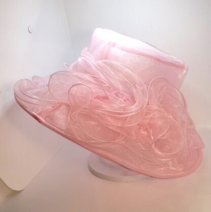 Pink wide brim hat with bow, right side view.